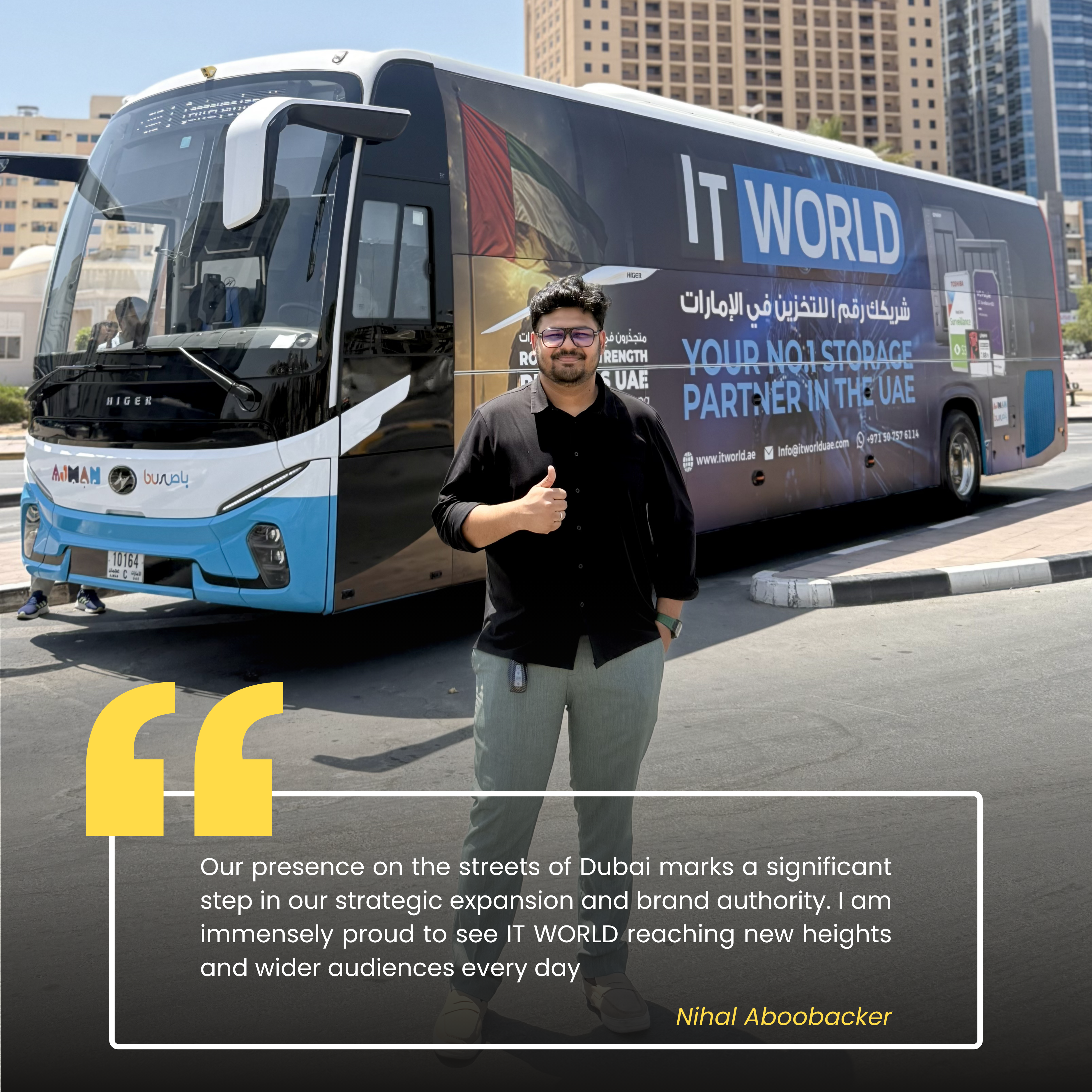 Nihal — IT World Trading team member, photographed beside the RTA campaign bus